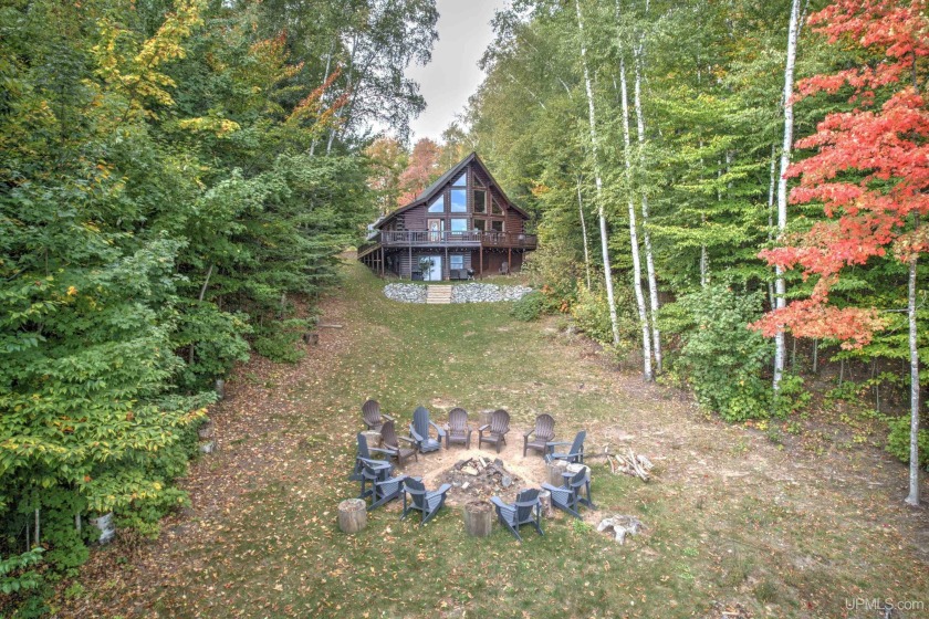 Escape to the tranquil beauty of the Upper Peninsula with this - Beach Home for sale in Munising, Michigan on Beachhouse.com
