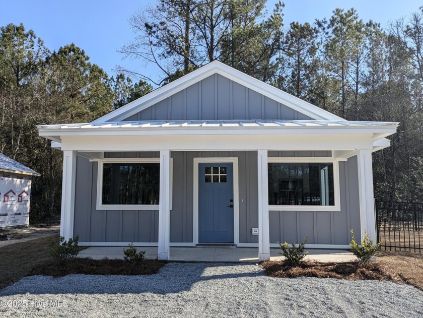 Discover Coastal Elegance at The Cabins at Old Horse a new small - Beach Condo for sale in Swansboro, North Carolina on Beachhouse.com