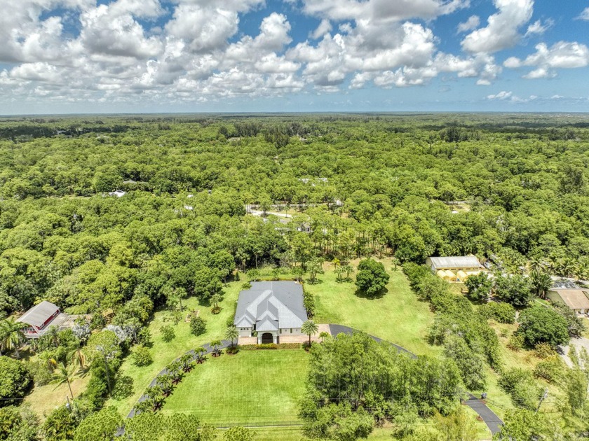 Welcome to the warmth and elegance of this 2.5 acre Jupiter FL - Beach Home for sale in Jupiter, Florida on Beachhouse.com