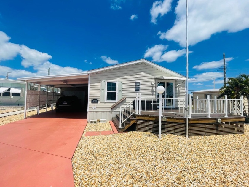 This immaculately maintained 2008 doublewide home with almost - Beach Home for sale in Bradenton, Florida on Beachhouse.com