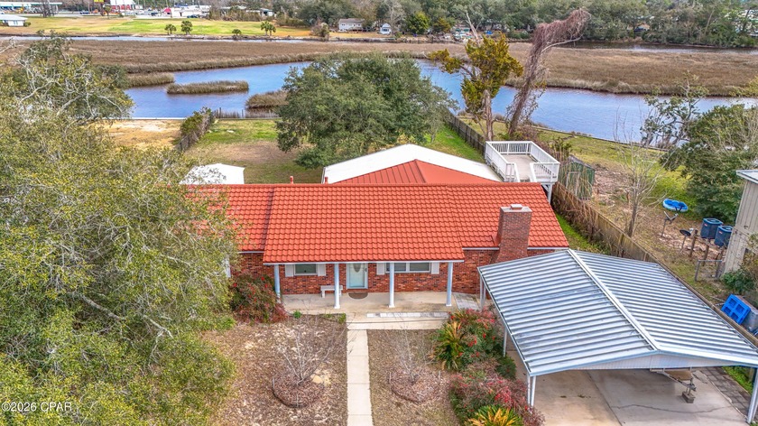 Experience waterfront living on deep-water Gulf access! Located - Beach Home for sale in Southport, Florida on Beachhouse.com