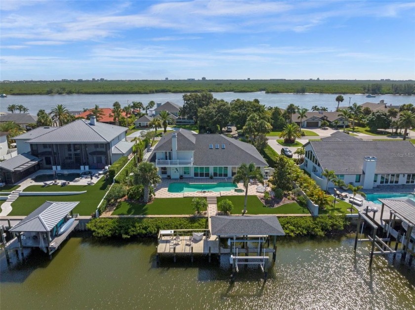 Discover a rare opportunity to own a CUSTOM-RENOVATED luxury - Beach Home for sale in New Smyrna Beach, Florida on Beachhouse.com