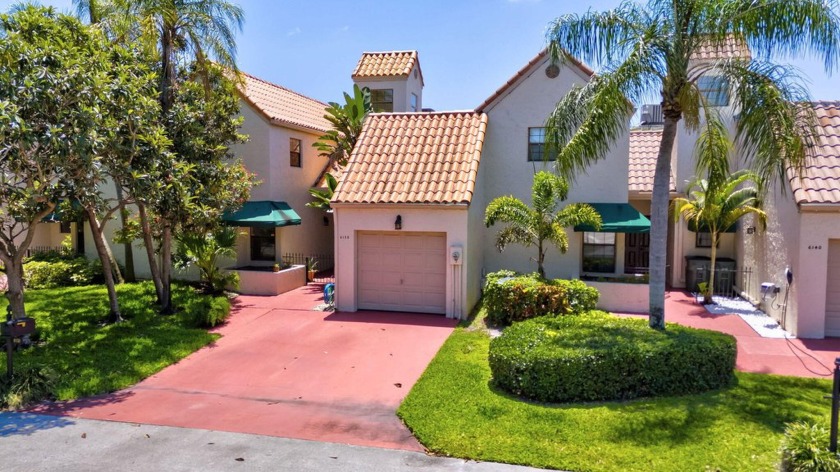 This Turn-Key home offers an open-concept layout that flows - Beach Townhome/Townhouse for sale in Boca Raton, Florida on Beachhouse.com