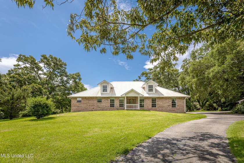 Welcome to your dream home, a custom-built sanctuary nestled on - Beach Home for sale in Biloxi, Mississippi on Beachhouse.com