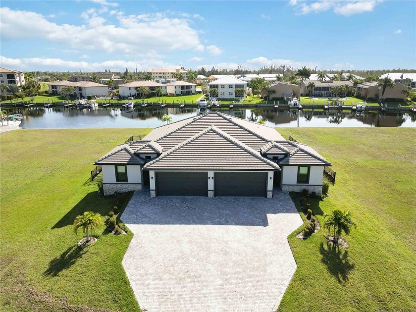 Welcome to 3240 Wood Thrush Drive, an exceptional waterfront - Beach Townhome/Townhouse for sale in Punta Gorda, Florida on Beachhouse.com