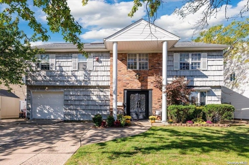 Welcome to this spectacular waterfront Colonial in Oceanside's - Beach Home for sale in Oceanside, New York on Beachhouse.com