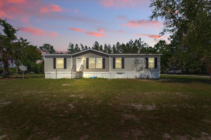 This beautiful 4-bedroom, 2-bath home sits on 3.74 serene acres - Beach Home for sale in Perry, Florida on Beachhouse.com