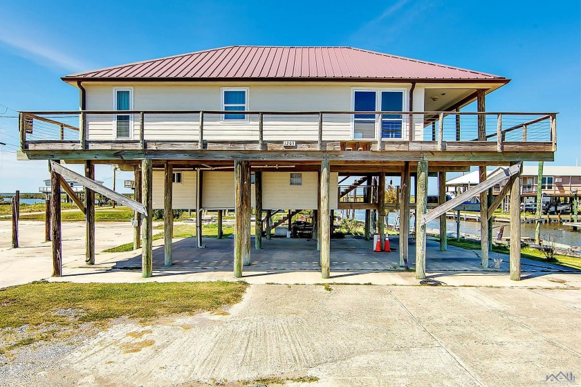 Located on 2 lots off Highway 1. This is a one of a kind - Beach Home for sale in Grand Isle, Louisiana on Beachhouse.com
