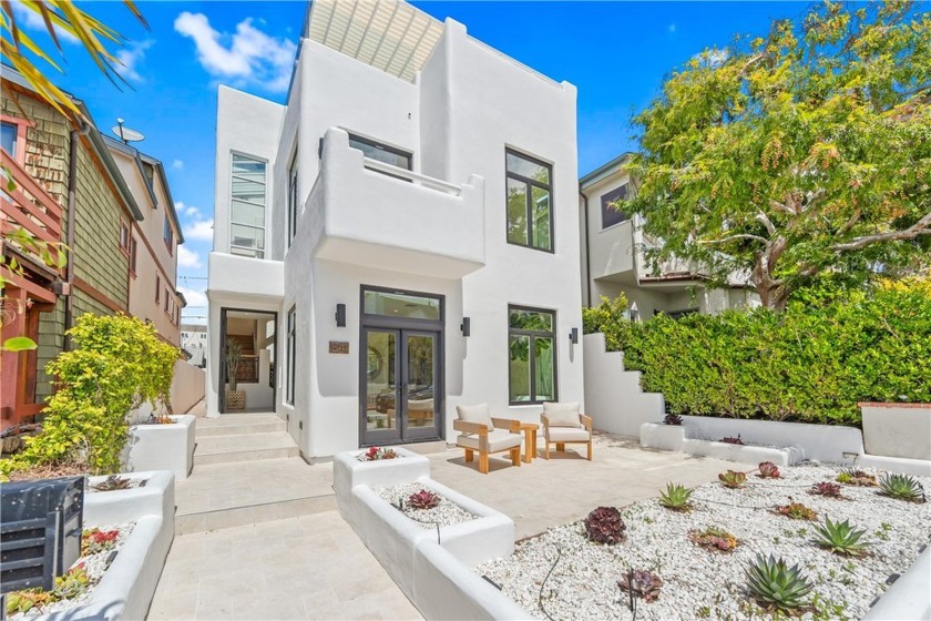 This luxury home is completely remodeled inside and out!  It is - Beach Home for sale in Manhattan Beach, California on Beachhouse.com