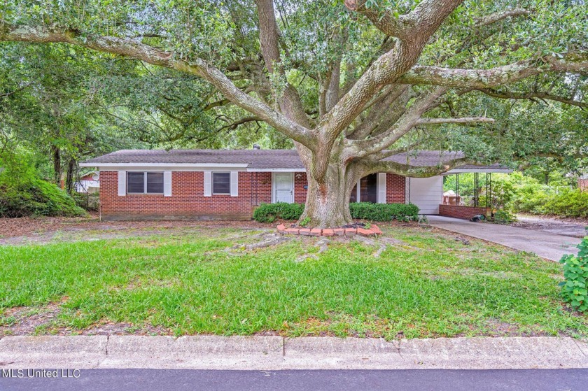 This charming property is nestled in a vibrant and sought-after - Beach Home for sale in Biloxi, Mississippi on Beachhouse.com