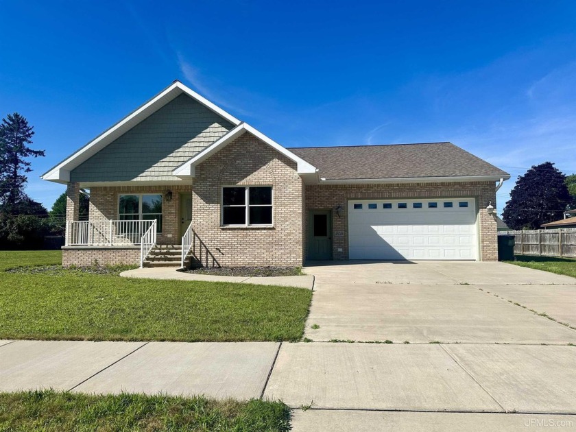 This home offers a rare opportunity to put your own finishing - Beach Home for sale in Escanaba, Michigan on Beachhouse.com