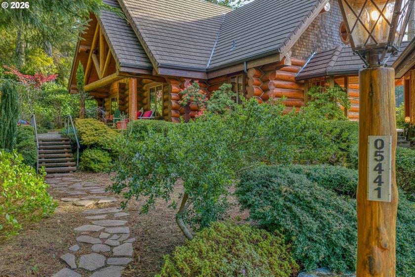 Stunning, one-of-a-kind custom log home with guest quarters - Beach Home for sale in Florence, Oregon on Beachhouse.com