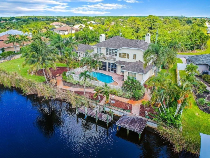 Experience Waterfront living at its finest with this - Beach Home for sale in Port Charlotte, Florida on Beachhouse.com