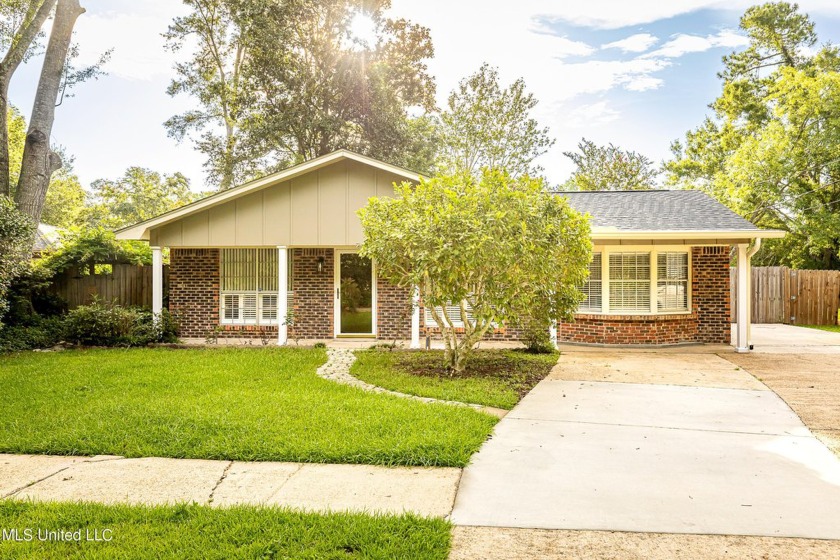 LOCATION, LOCATION, LOCATION.  THIS ABSOLUTE DOLLHOUSE is - Beach Home for sale in Ocean Springs, Mississippi on Beachhouse.com