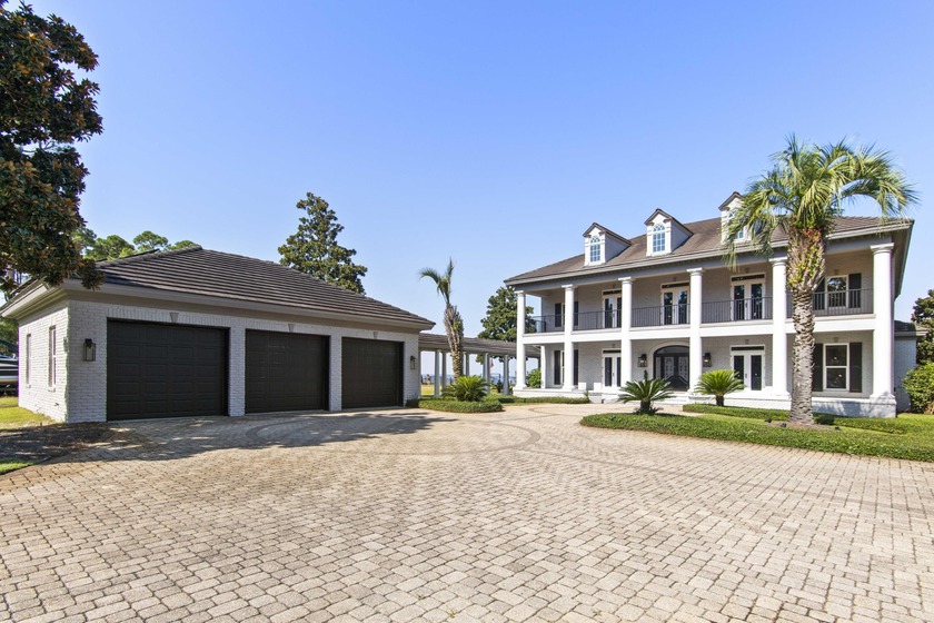 Experience luxury living on nearly an acre of prime bayfront - Beach Home for sale in Santa Rosa Beach, Florida on Beachhouse.com
