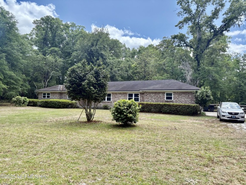This beautiful all-brick three bedroom two bathroom home sits on - Beach Home for sale in Green Cove Springs, Florida on Beachhouse.com