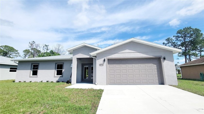 LOOKS LIKE NEW!!! - 3 BEDROOM 2 BATH WITH IMPACT WINDOWS AND - Beach Home for sale in North Port, Florida on Beachhouse.com