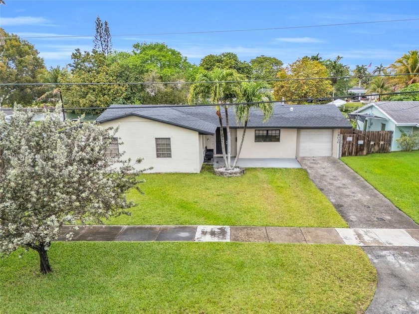 Beautiful 4-bedroom, 2-bath home with den situated on a serene - Beach Home for sale in Cutler Bay, Florida on Beachhouse.com