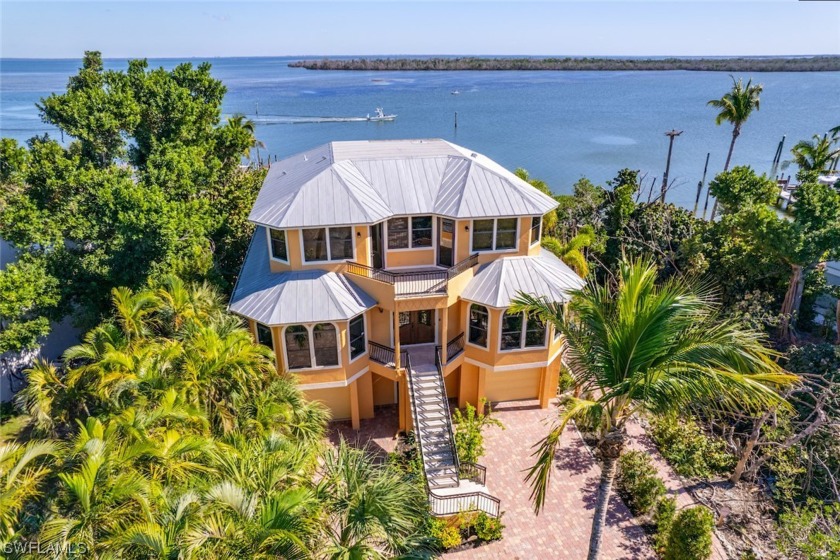 A magnificent waterfront property graces the Tween Waters area - Beach Home for sale in Captiva, Florida on Beachhouse.com