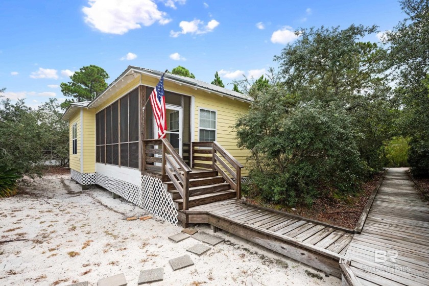 Welcome to your Gulf Coast escape! This rare free-standing - Beach Home for sale in Gulf Shores, Alabama on Beachhouse.com