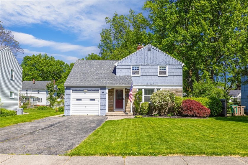 Welcome to this warm and inviting classic Colonial nestled in - Beach Home for sale in Rochester, New York on Beachhouse.com