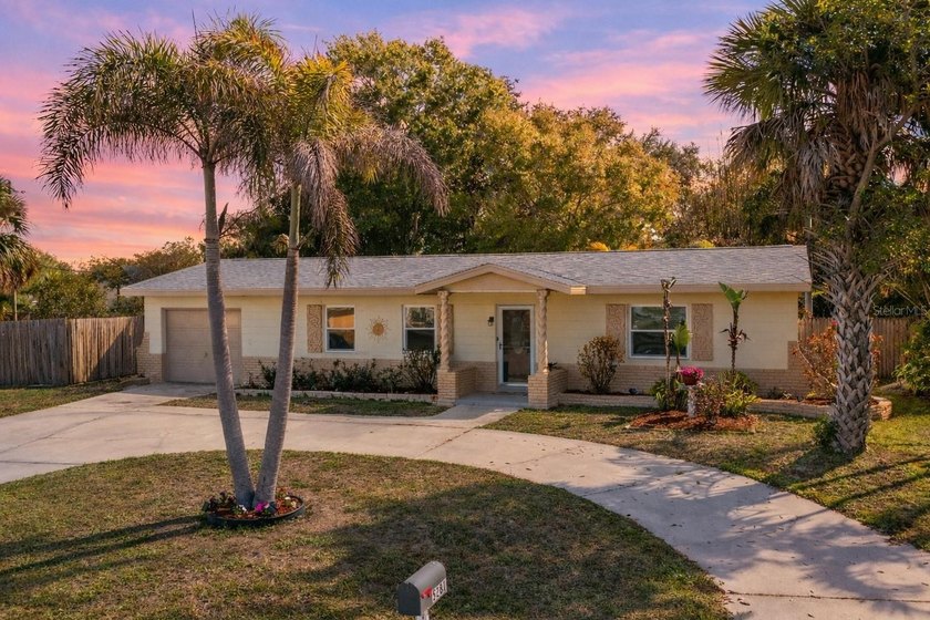 Enjoy the best of both worlds with this inviting home, offering - Beach Home for sale in Kenneth City, Florida on Beachhouse.com