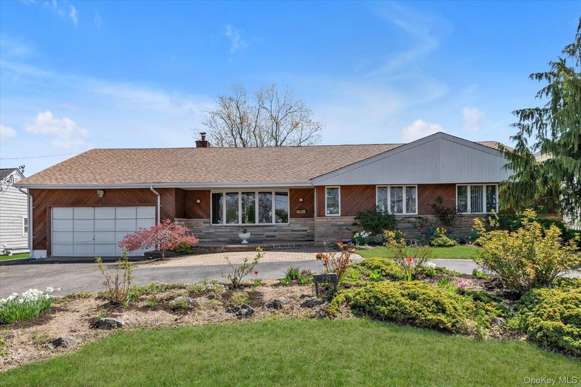 Discover a truly one-of-a-kind waterfront ranch in the heart of - Beach Home for sale in Massapequa, New York on Beachhouse.com