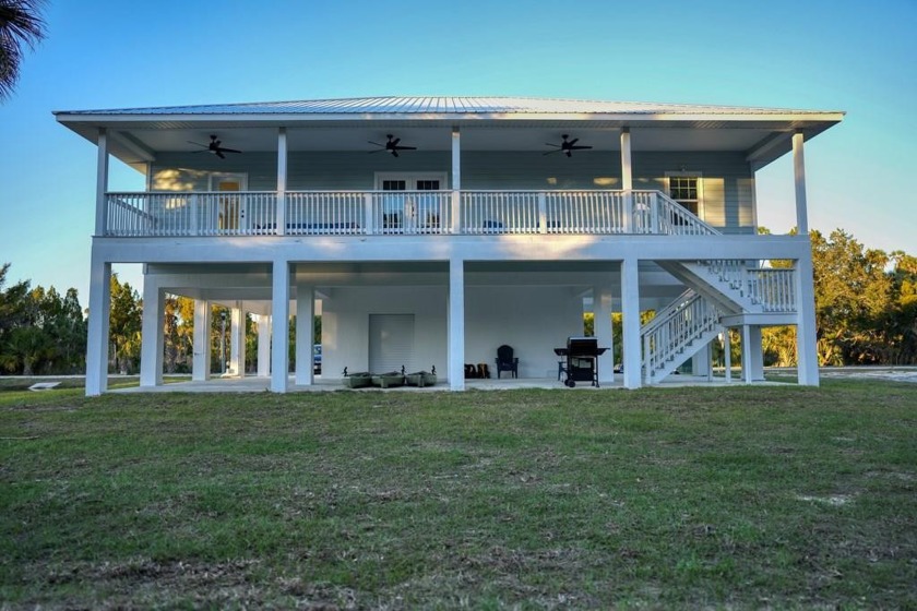 This brand-new 3/2 home with an office is situated on a - Beach Home for sale in Crystal River, Florida on Beachhouse.com