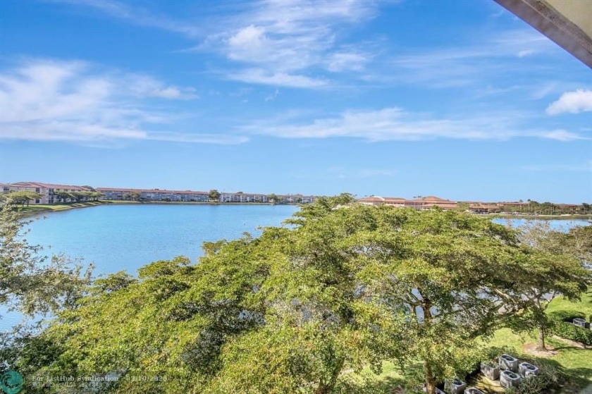 Wake up to stunning lake views from your patio, Jazmin model! - Beach Condo for sale in Pembroke Pines, Florida on Beachhouse.com