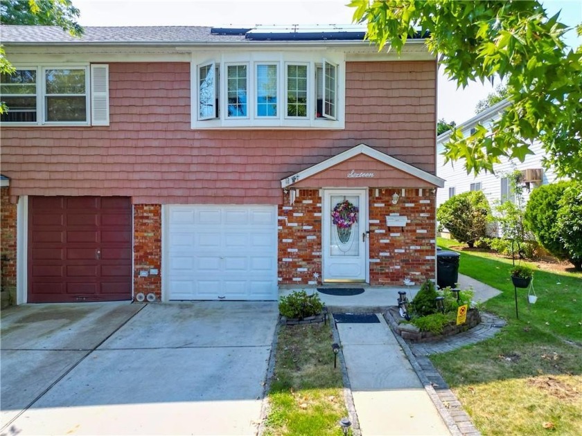 Welcome to this beautiful large single semi-detached home in the - Beach Home for sale in Staten  Island, New York on Beachhouse.com