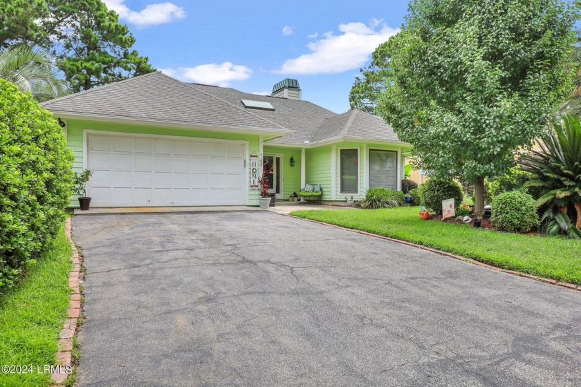 This inviting property blends comfort, charm, and natural beauty - Beach Home for sale in Saint Helena Island, South Carolina on Beachhouse.com