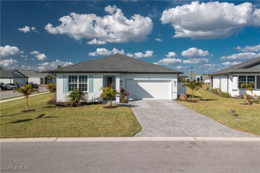 This home is ready to move in! With Impact Glass on doors and - Beach Home for sale in Port Charlotte, Florida on Beachhouse.com