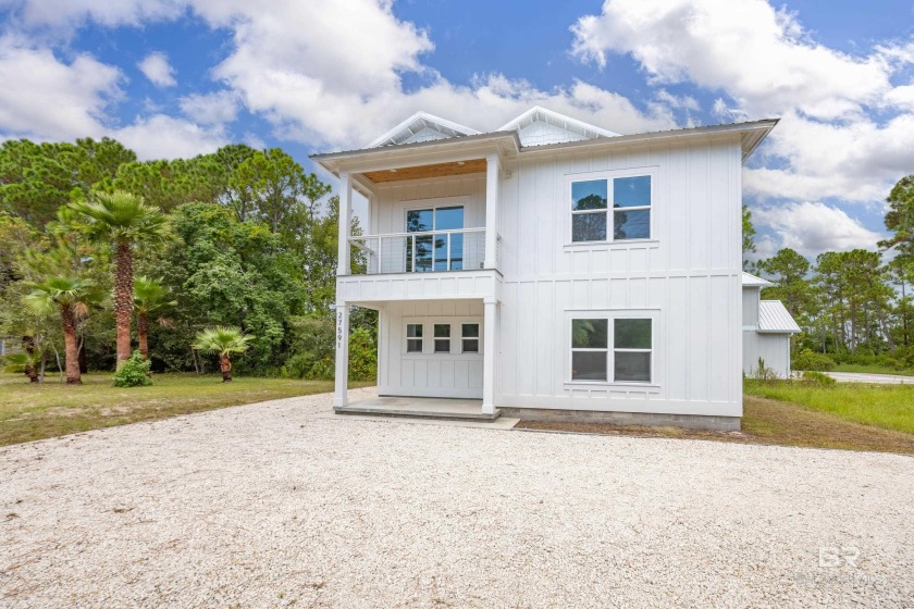STUNNING NEW CONSTRUCTION in the heart of Orange Beach! This - Beach Home for sale in Orange Beach, Alabama on Beachhouse.com