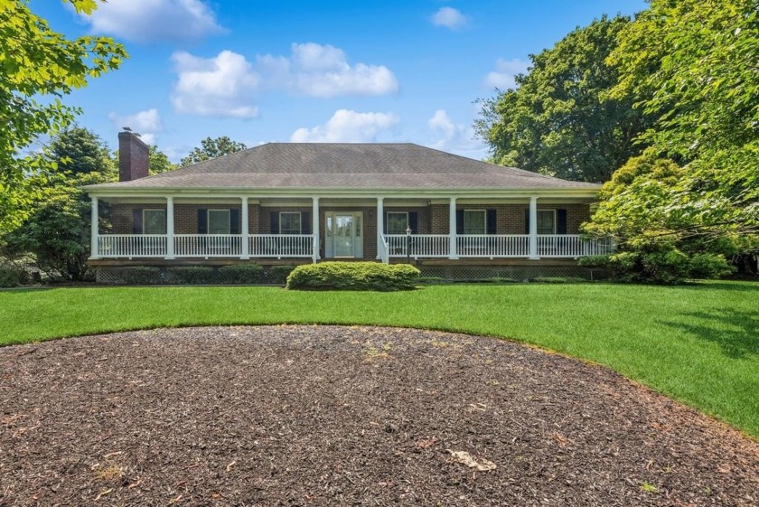 Welcome to this exceptional custom-designed Colonial, perfectly - Beach Home for sale in East Patchogue, New York on Beachhouse.com
