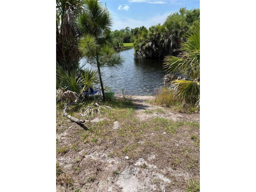 OVERSIZED CORNER LOT THAT SITS ON TWO WATERWAYS AND LEADS OUT TO - Beach Lot for sale in Port Charlotte, Florida on Beachhouse.com