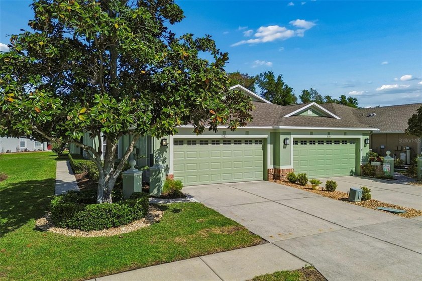 Welcome to this beautifully updated, move-in ready villa located - Beach Home for sale in Land O Lakes, Florida on Beachhouse.com
