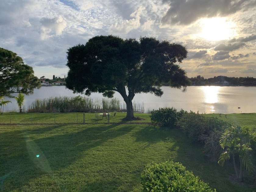 Beautiful remodeled hidden gem lakefront home on almost a half - Beach Home for sale in West Palm Beach, Florida on Beachhouse.com