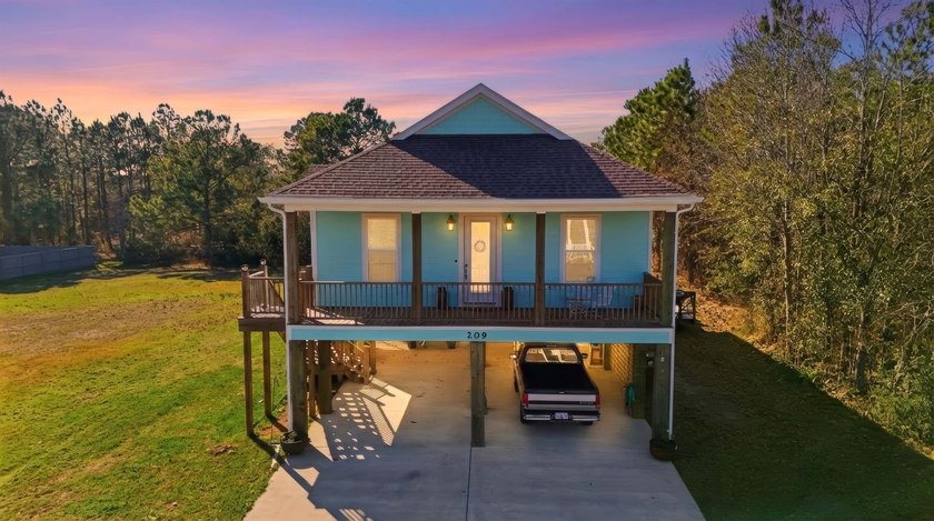 WALK to the OCEAN + *Rare* DOUBLE LOT (0.5 ACRE) + BEACH VIEWS - Beach Home for sale in Long Beach, Mississippi on Beachhouse.com