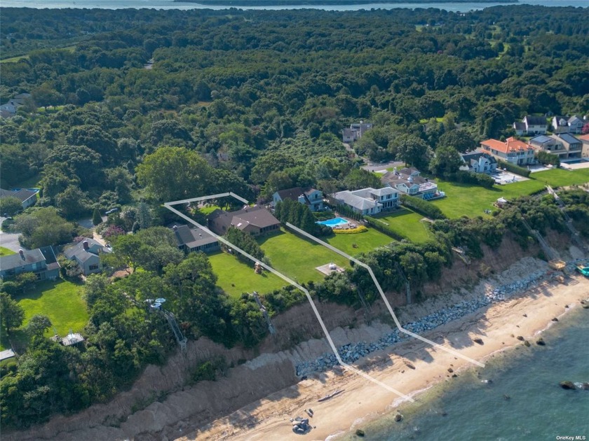 This Expanded Ranch sits high on the Bluff w/forever views over - Beach Home for sale in East Marion, New York on Beachhouse.com