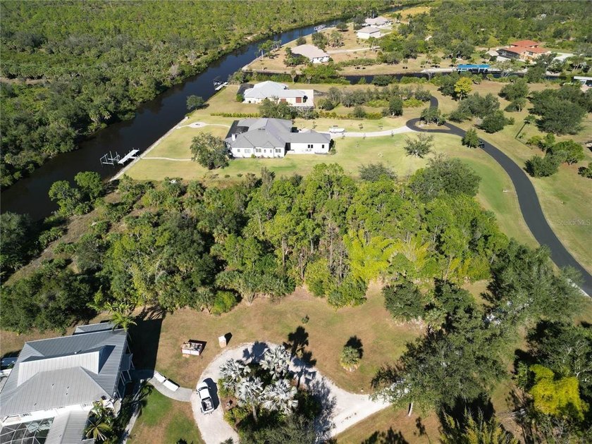 UPDATED PICUTRES AND AERIAL VIDEO! Experience the perfect blend - Beach Acreage for sale in Port Charlotte, Florida on Beachhouse.com