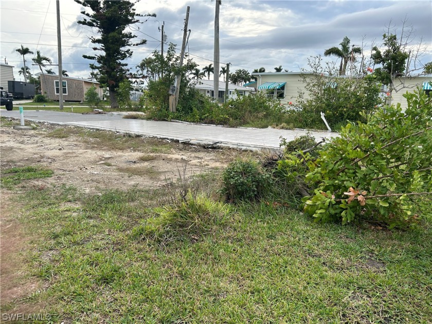 Vacant Mobile home lot is ready for your new home! The damaged - Beach Lot for sale in ST. James City, Florida on Beachhouse.com