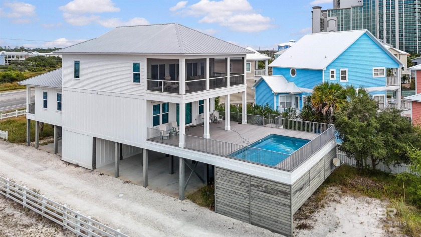 Just steps from the sugar-white sands of the Gulf, this - Beach Home for sale in Orange Beach, Alabama on Beachhouse.com