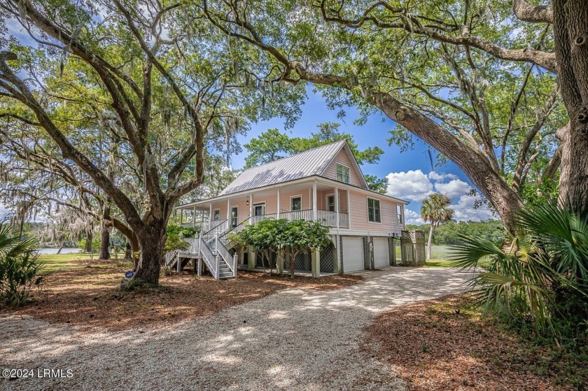 Nestled on a picturesque lot in the heart of Shammy Creek, this - Beach Home for sale in Beaufort, South Carolina on Beachhouse.com