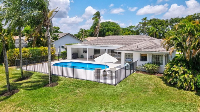 Step into elevated South Florida living with this fully - Beach Home for sale in Boca Raton, Florida on Beachhouse.com