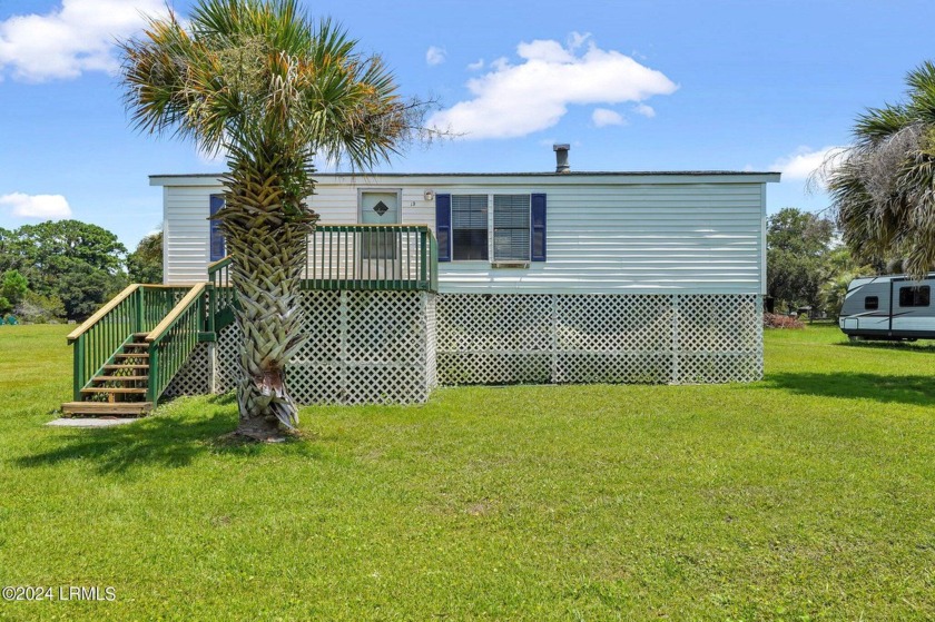 Welcome to this quaint three-bedroom home on St. Helena Island - Beach Home for sale in Saint Helena Island, South Carolina on Beachhouse.com