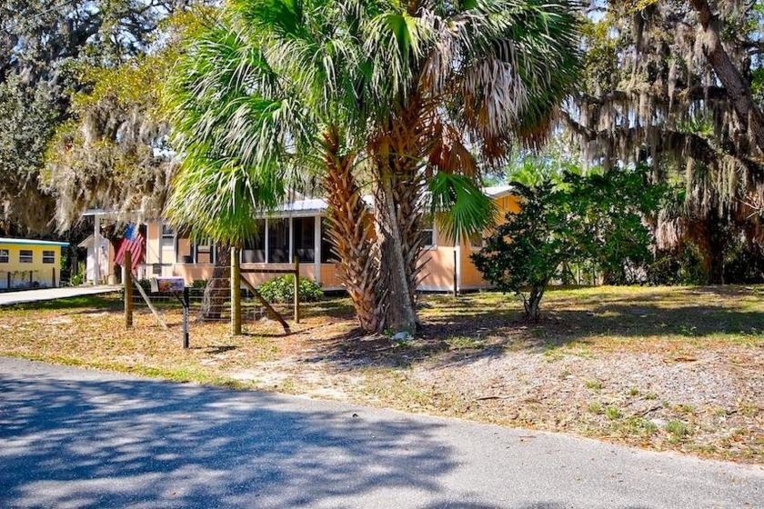 SLOW DOWN! DON'T MISS THIS PEACH OF A HOUSE! It's hard to - Beach Home for sale in Cedar Key, Florida on Beachhouse.com