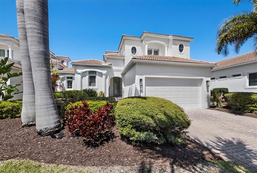 Tucked behind the gates of Bay Isles in the Emerald Pointe - Beach Condo for sale in Longboat Key, Florida on Beachhouse.com