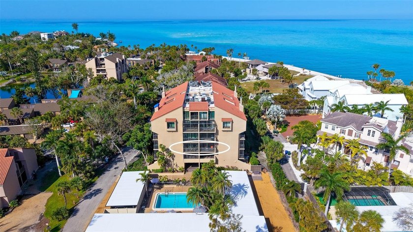 Perched among the treetops in the beloved Sandy Cove community - Beach Condo for sale in Sarasota, Florida on Beachhouse.com
