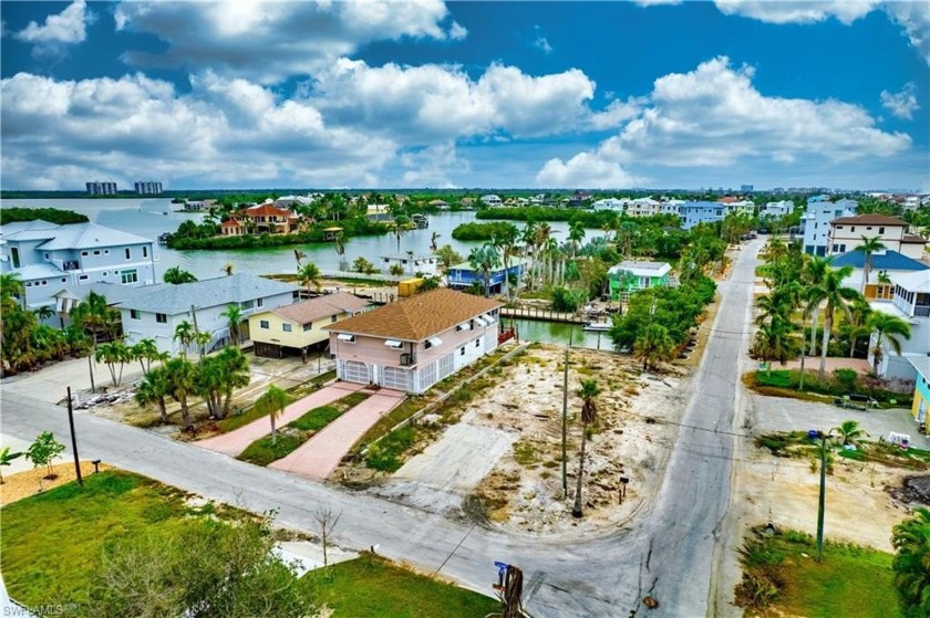 Very short walk to the beach and deep Gulf access canal.  Corner - Beach Lot for sale in Bonita Springs, Florida on Beachhouse.com