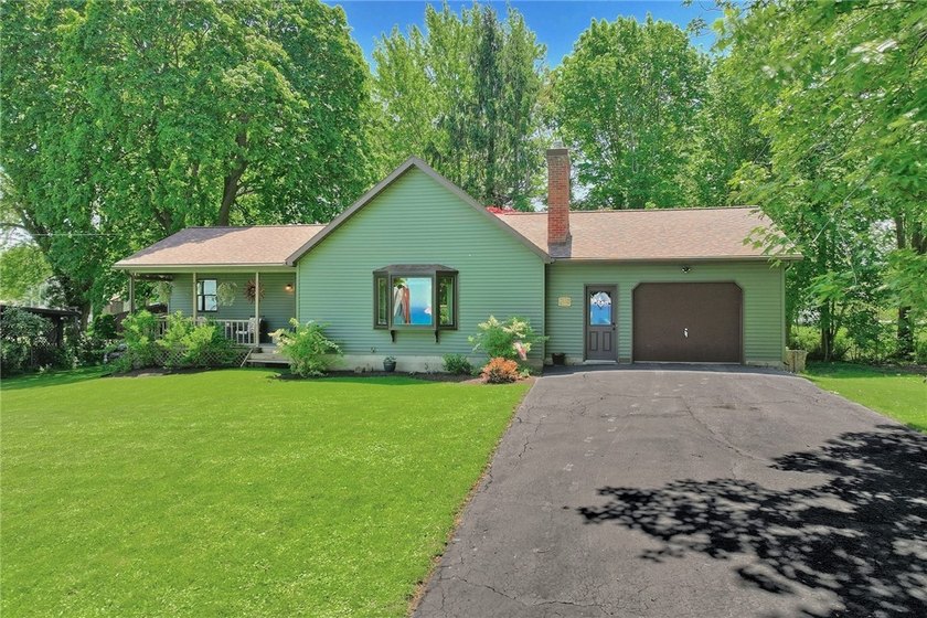 LAKE VIEWS!! VAULTED CEILINGS!! OPEN CONCEPT!! MAJOR UPDATES - Beach Home for sale in Ontario, New York on Beachhouse.com